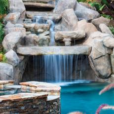 Tropical Swimming Pool With Waterfall