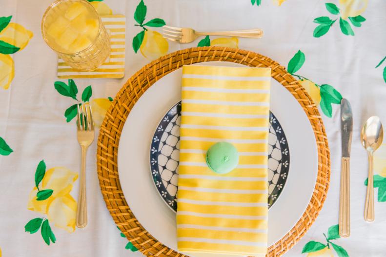 Don’t hesitate to mix colors and styles for your staycation brunch. Here, we have layered the table in stripes, wicker and bright color for a modern yet traditional take on brunch decor. If stripes are not your thing, you can enhance your wicker chargers by spray painting them a fun color and take things a step further with a homemade menu card. 