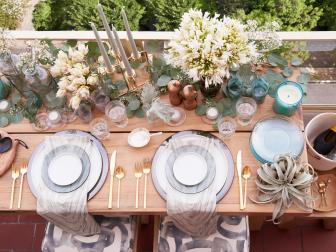 My favorite part of outdoor entertaining is creating a tablescape that tells a unique story.This Urban Picnic at my New York apartment is a blend of elements. I especially like the organic mix of natural materials and various finishes we used here, with textiles by Studio NYC and gold flatware by West Elm.