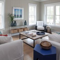 Living Room With Shiplap Walls and Moroccan Blue Side Table