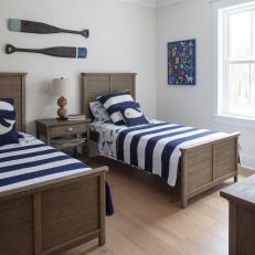 Kids' Coastal Bedroom With Paddles and Striped Twin Beds
