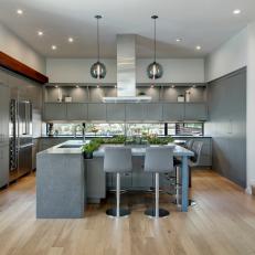 Gray Modern Open Plan Kitchen With Two Stools