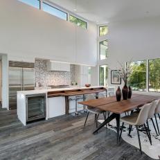 Modern Kitchen and Dining Room With High Ceiling