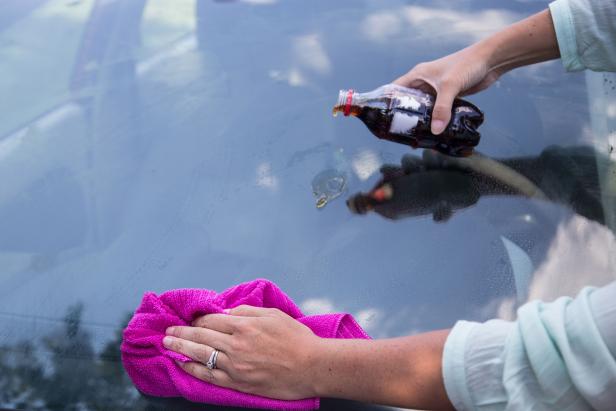 pouring soda on windshield