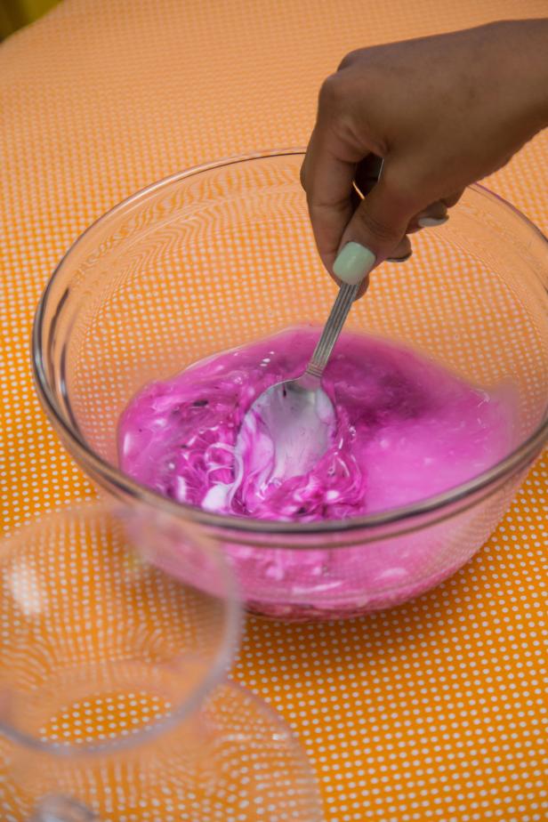 Stir the glue, water and borax. The slime will come together immediately.