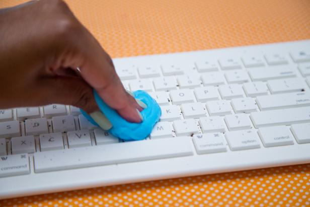 Use the cleaning slime to get hard to reach gunk from a keyboard.