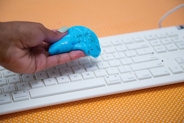 The cleaning slime picks up the smallest of debris from in between the keys.