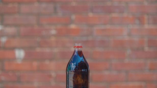 bottle of dark soda