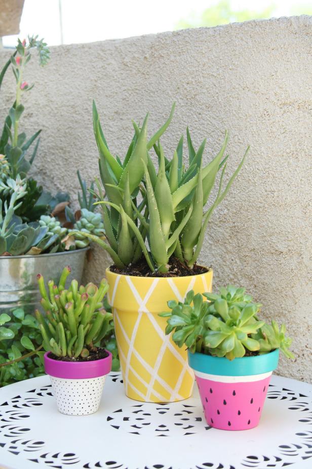 These vivid, cheery planters from Rebecca at The Crafted Sparrow are sure to bring a smile to your guests’ faces. With paint, paint markers and a few other supplies, you can easily create fruit-inspired pots for your summer party.