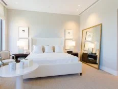 Contemporary White Bedroom in a Condo