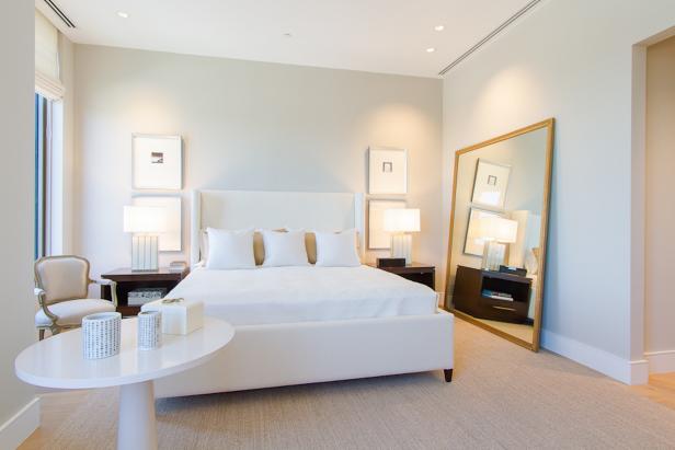 Contemporary White Bedroom in a Condo