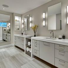 Chic Gray Master Bathroom With Double Vanity and Gray Tile Flooring
