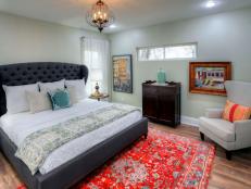 Contemporary Gray Master Bedroom with a Red Persian Rug