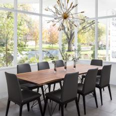 Midcentury Dining Room With Black Chairs