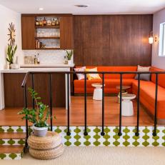 Midcentury Bar and Lounge With Orange Banquette