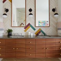 Multicolored Double Vanity Bathroom With Black Sconces