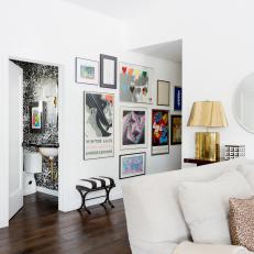 White Gallery Wall Outside Black-and-White Powder Room