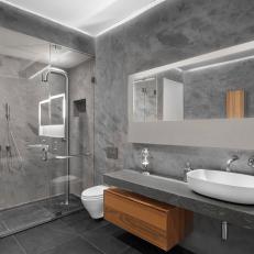 Gray Modern Bathroom With Wood Vanity