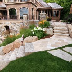 Stone Stairway Retaining Wall Leads from Upper Patio to Lower Patio 
