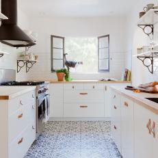Remodeled Ole Hanson Kitchen With White Cabinets and Tile