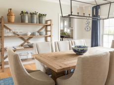 Gray Dining Room With Wood Table and Open Shelving