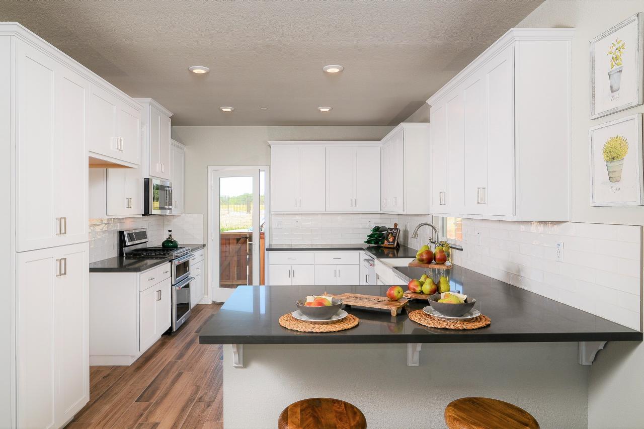 White Country Kitchen With Black Counter and Tile ...