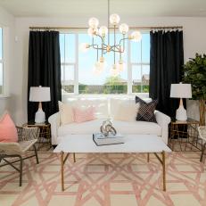 Midcentury Modern Living Room With Pink Patterned Rug