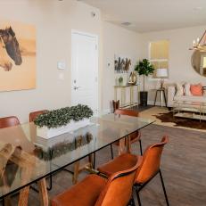 Great Room Dining Area With Glass Table and Horse Portrait