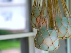 If you're looking for the perfect piece to complete an outdoor space or boho lounge, you will “knot” be disappointed by this thrifty DIY.