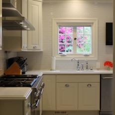 Elegant White Tudor Kitchen with Window