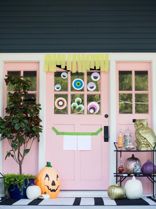 Create some googly curb appeal with a mischievous monster door. Simple cardstock, crepe paper, and tape can make a creative funky face for your front door.