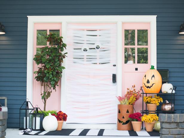 Enjoy the Halloween spirit with a decorative front door that is easy and quick. Wrap your front door up with crepe paper, top it off with huge googly eyes, and â  batsâ   all folks!