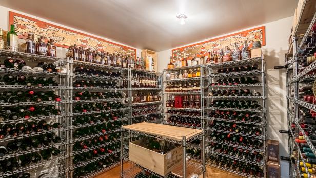 Wine Room at Home with Industrial Stainless Steel Shelving 