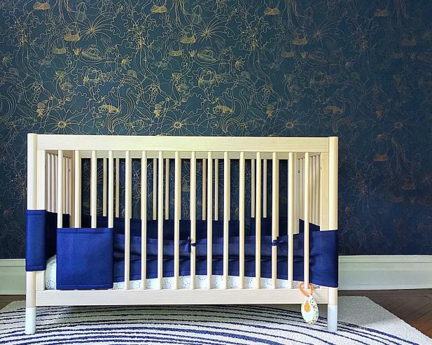 Modern Nursery with Copper and Blue Sea Wallpaper and White Crib
