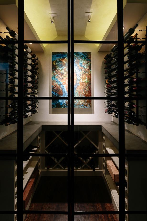 Modern Wine Room with Custom Doors and Artwork