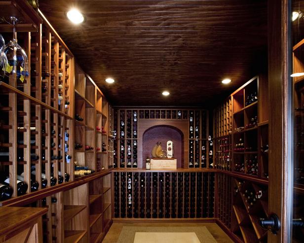 Wine Room with Rich Wood Custom Shelving and Recessed Lighting