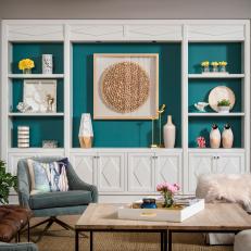 Living Room With Blue and White Built-In Shelves