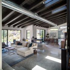 Industrial Great Room With Wood Beams