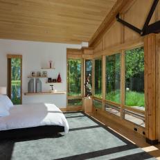Rustic Master Bedroom With Deck