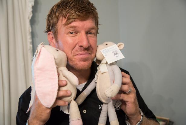 Portrait of Fixer Upper Host Chip Gaines with stuffed animals in the Purks' new nursery, as seen on HGTV's Fixer Upper.  (portrait)