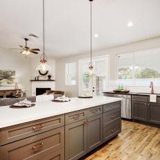 Gray, Shaker Cabinets and White, Quartz Countertop Create Design Continuity in Remodeled Spaces
