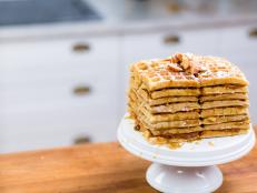 Dive right into the holiday season with this delicious waffle apple stack cake filled with all of your favorite seasonal flavors.