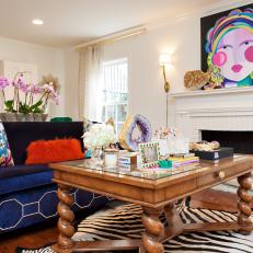 Multicolored Eclectic Sitting Room With Blue Sofa