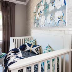 Nursery Crib With Blue Art