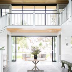 Glass Doors Provide Seamless Access Between Indoor and Outdoor Spaces