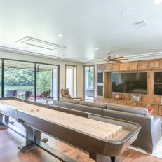 Rustic Game Room With Narrow Pool Table