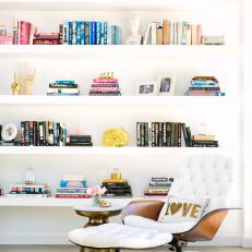 Open Shelving in Living Room Display's Family's Globe Collection