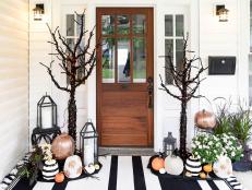 Bring the holiday fun to your porch with these chic and festive outdoor Halloween decorations.