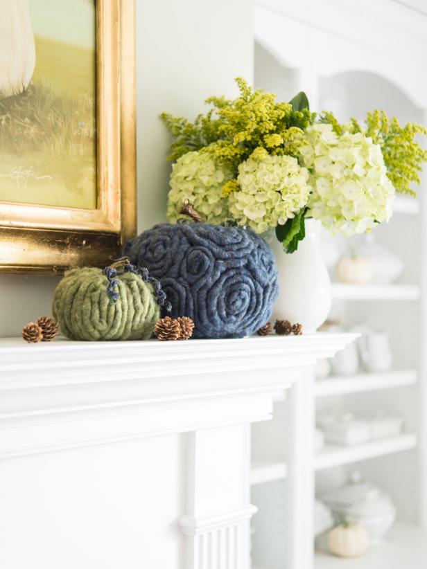 Spruce up some plastic pumpkins with the visual warmth and texture of chunky wool yarn.  This simple project is sure to take your fall dÃ©cor up a notch!