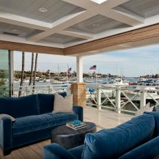 Seating Area With Blue Sofas and Harbor View